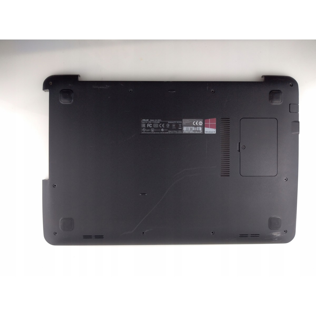 Obudowa dolna kadłubek głośniki Asus R557L sprawna